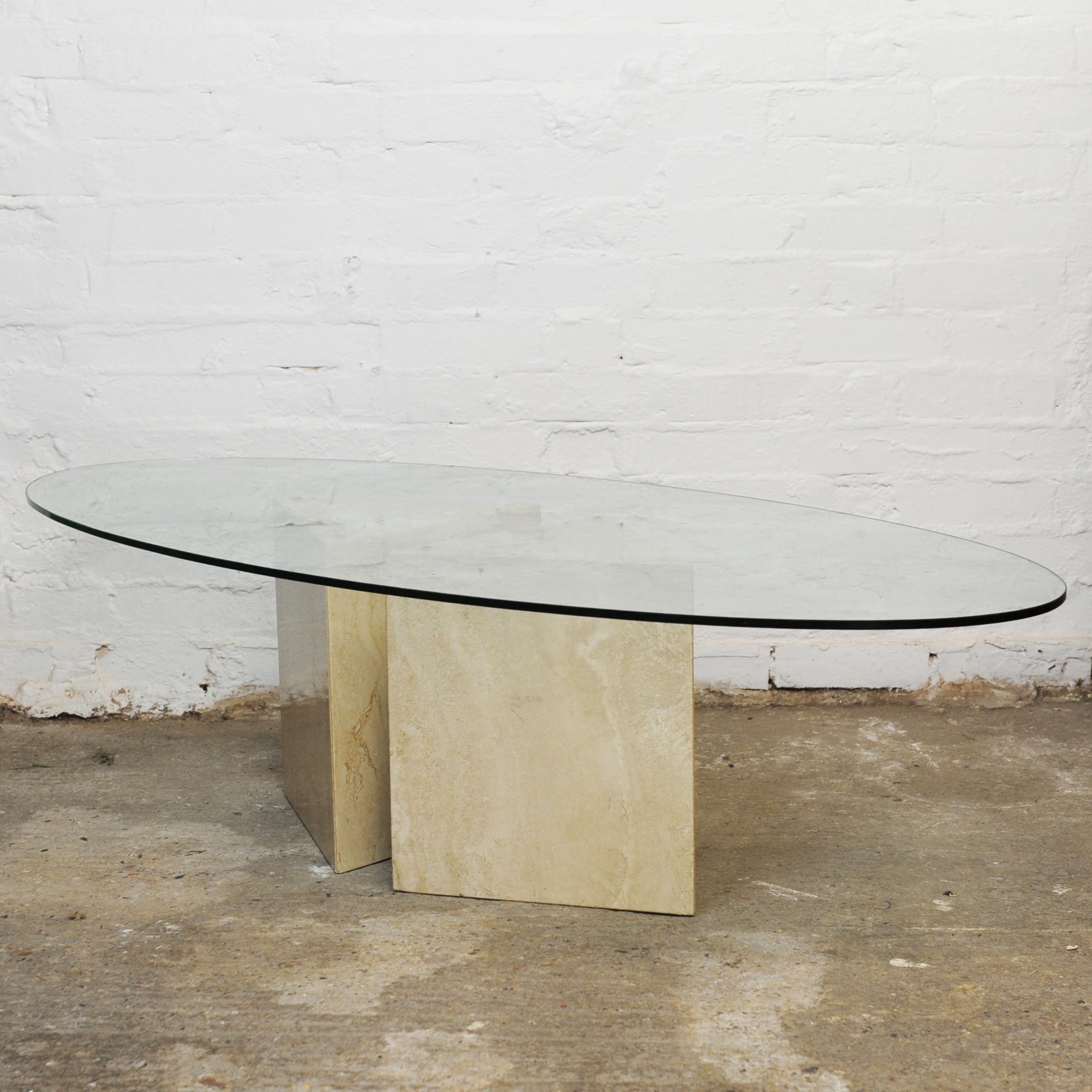 Hollywood Regency Glass topped Oval Coffee Table on a Travertine and Brass Base, 1980s For Sale