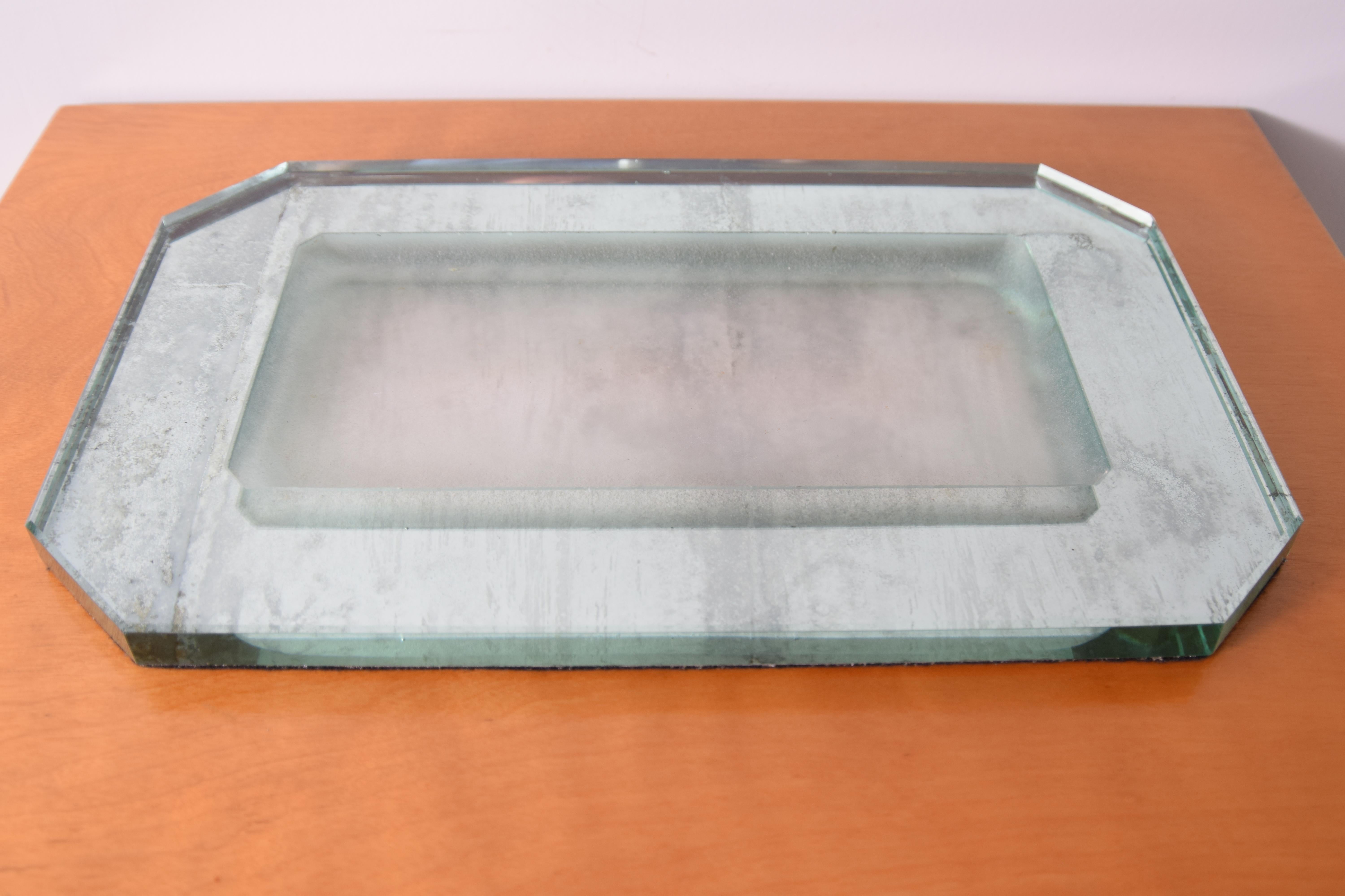 Thick mirrored glass tray by French designer Jean Luce (1895 - 1964), circa 1930, France. Tray features a heavily sandblasted, recessed center area. Measures 16 9/16