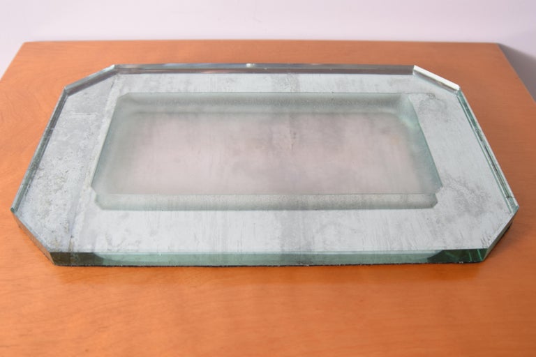 Thick mirrored glass tray by French designer Jean Luce (1895 - 1964), circa 1930, France. Tray features a heavily sandblasted, recessed centre area. Measures 16 9/16