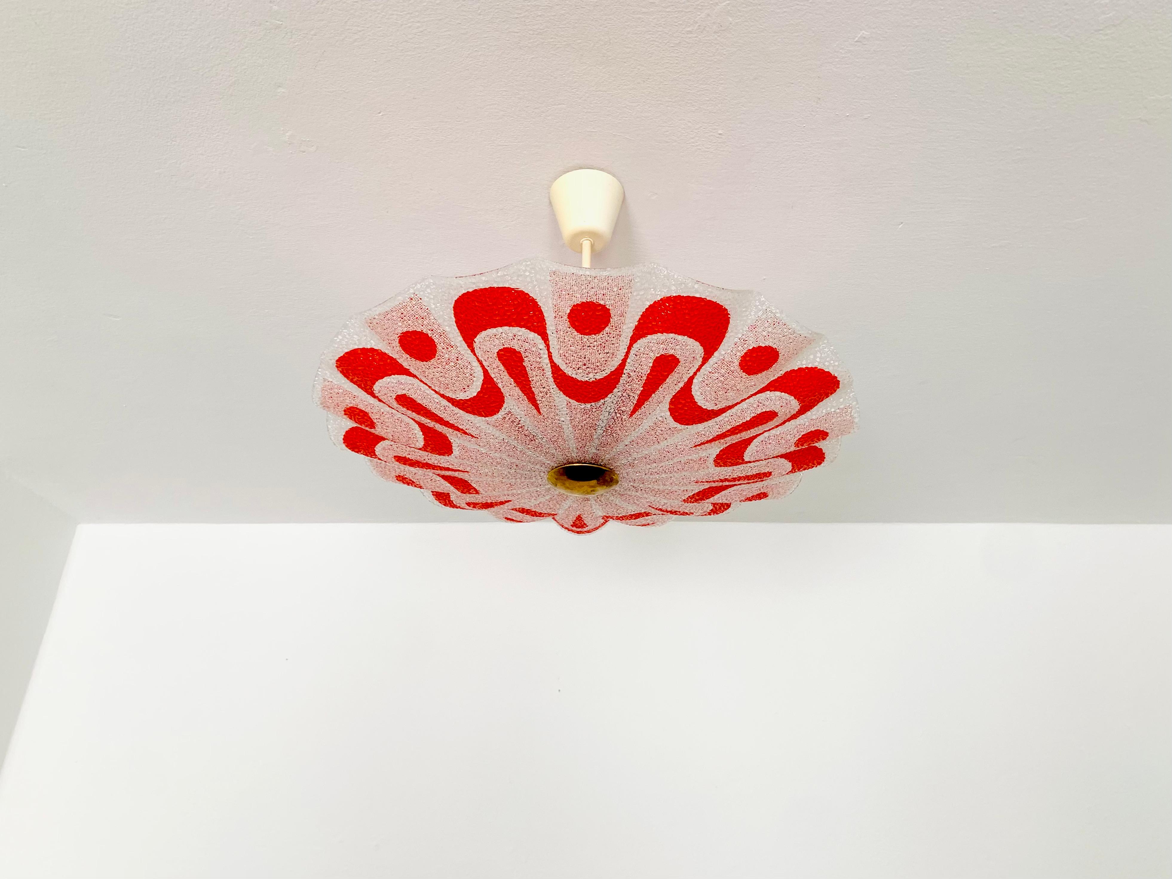 Wonderful ceiling lamp from the 1950s.
The glass has a special structure.
The design and the materials used create a great glittering light.
A breathtaking lamp and a real asset for every home.

Manufacturer: VEB

Condition:

Very good vintage