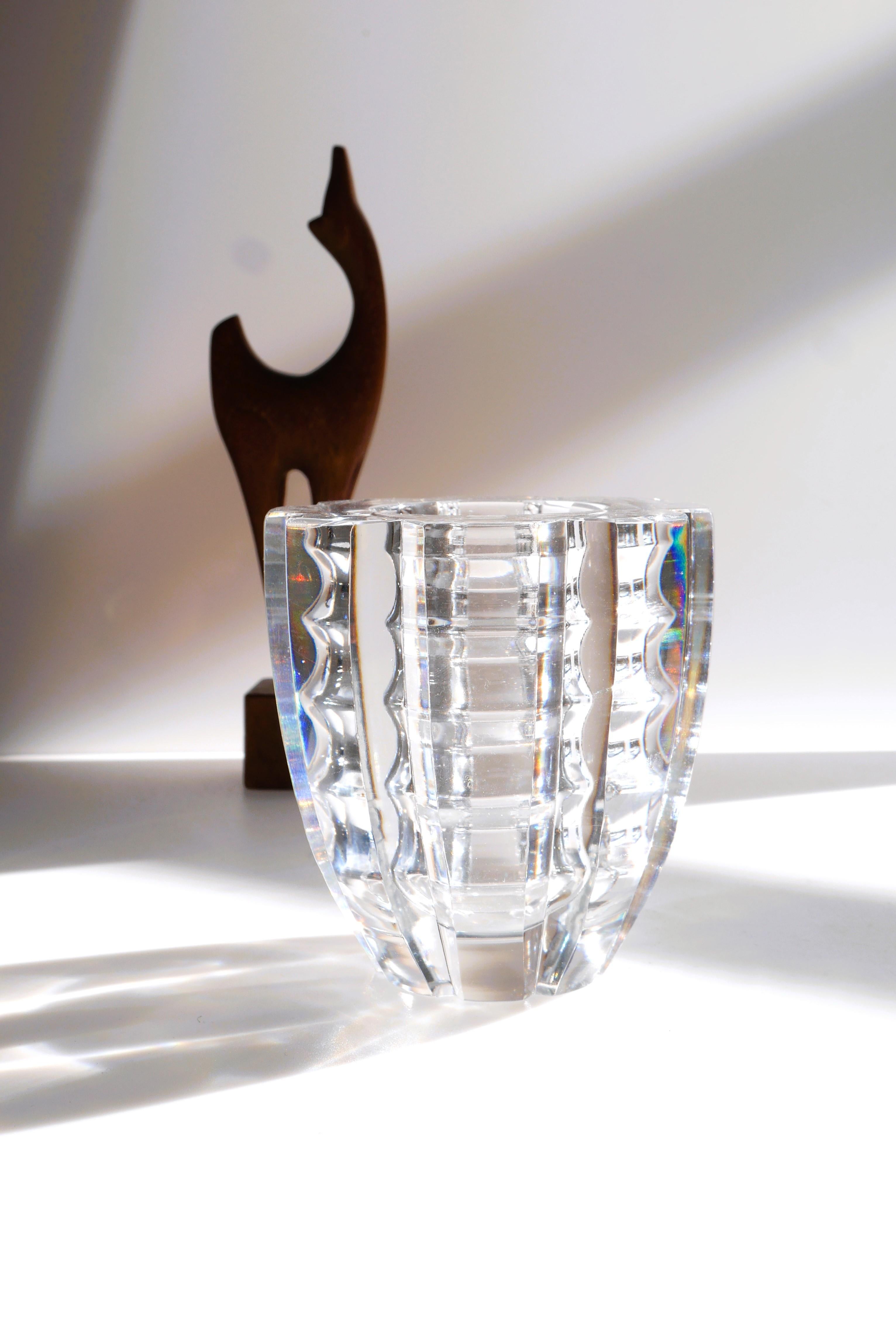 An amazingly cut crystal vase signed and handmade by the talented Edvin Öhrström for Orrefors, Sweden. This small vase really has a big impact, the brightness of the glass makes it really special, Öhrström was particularly skilled when it comes to
