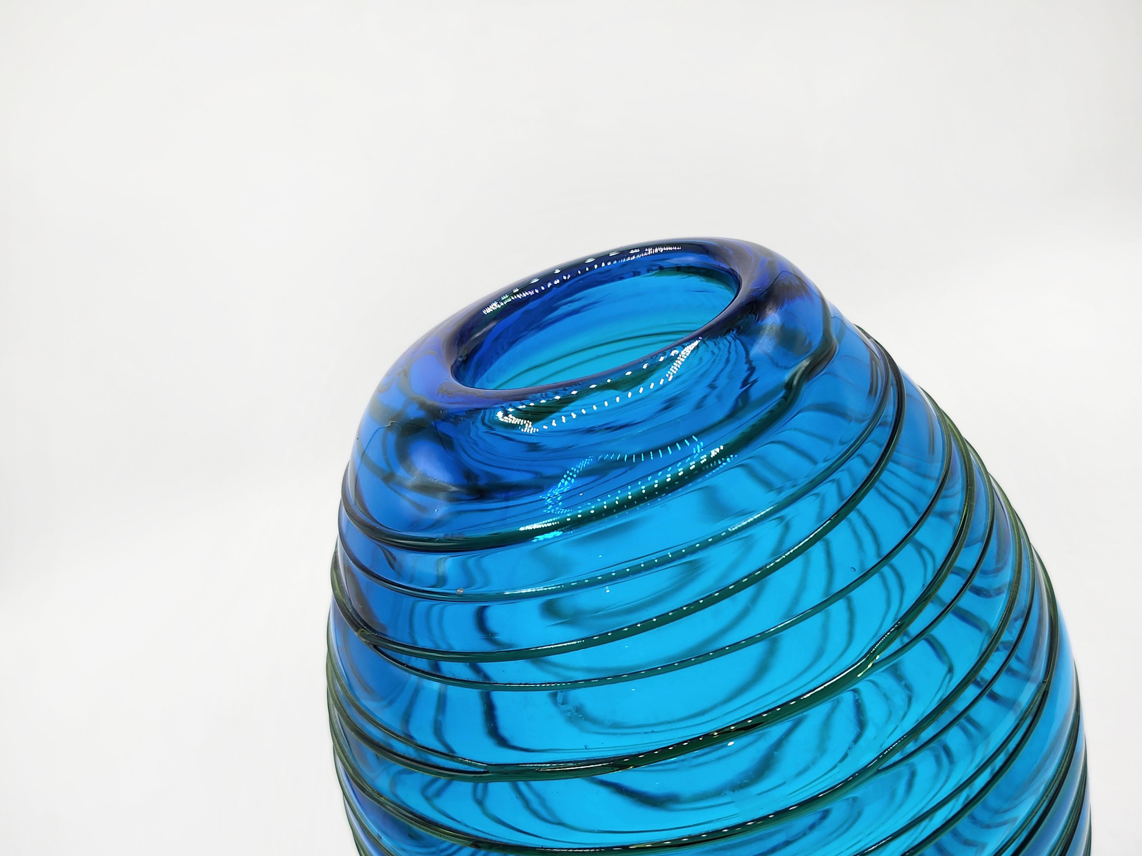 Glass Vase by Fulvio Bianconi for Venini 1970s
This stunning glass vase is a unique piece designed by renowned Italian artist and designer Fulvio Bianconi for Venini in the 1970s. The piece is a testament to Bianconi's talent and innovative vision,