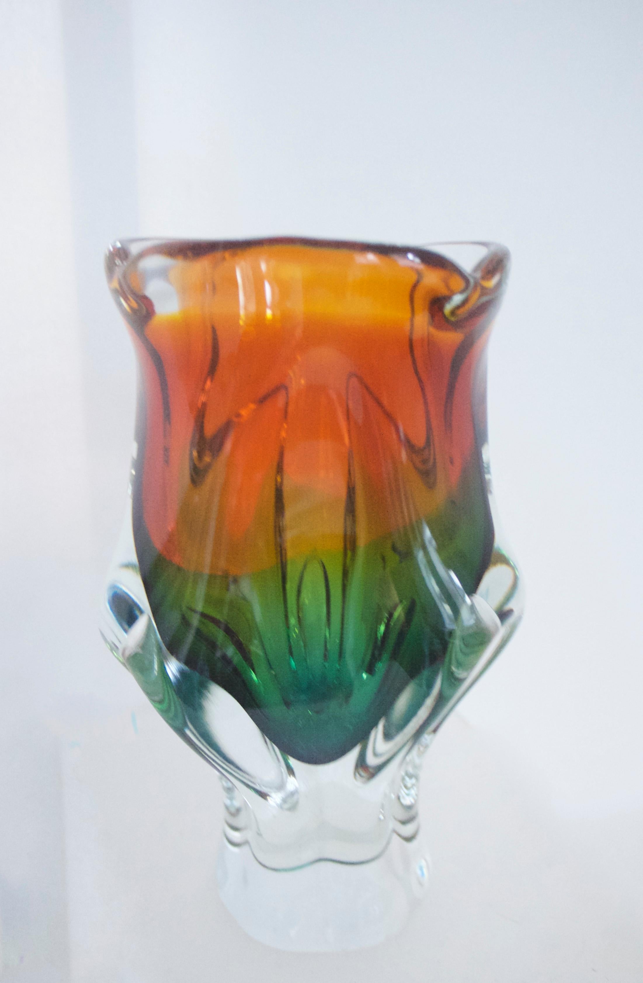 Blown glass vase designed by Josef Hospodka, Chribska glassworks,

The Chribska glassworks, full name Sklarna Chribska, was founded in 1414, and stayed in production until very recently. In 1882 it was bought by the Mayer family. Chribska became