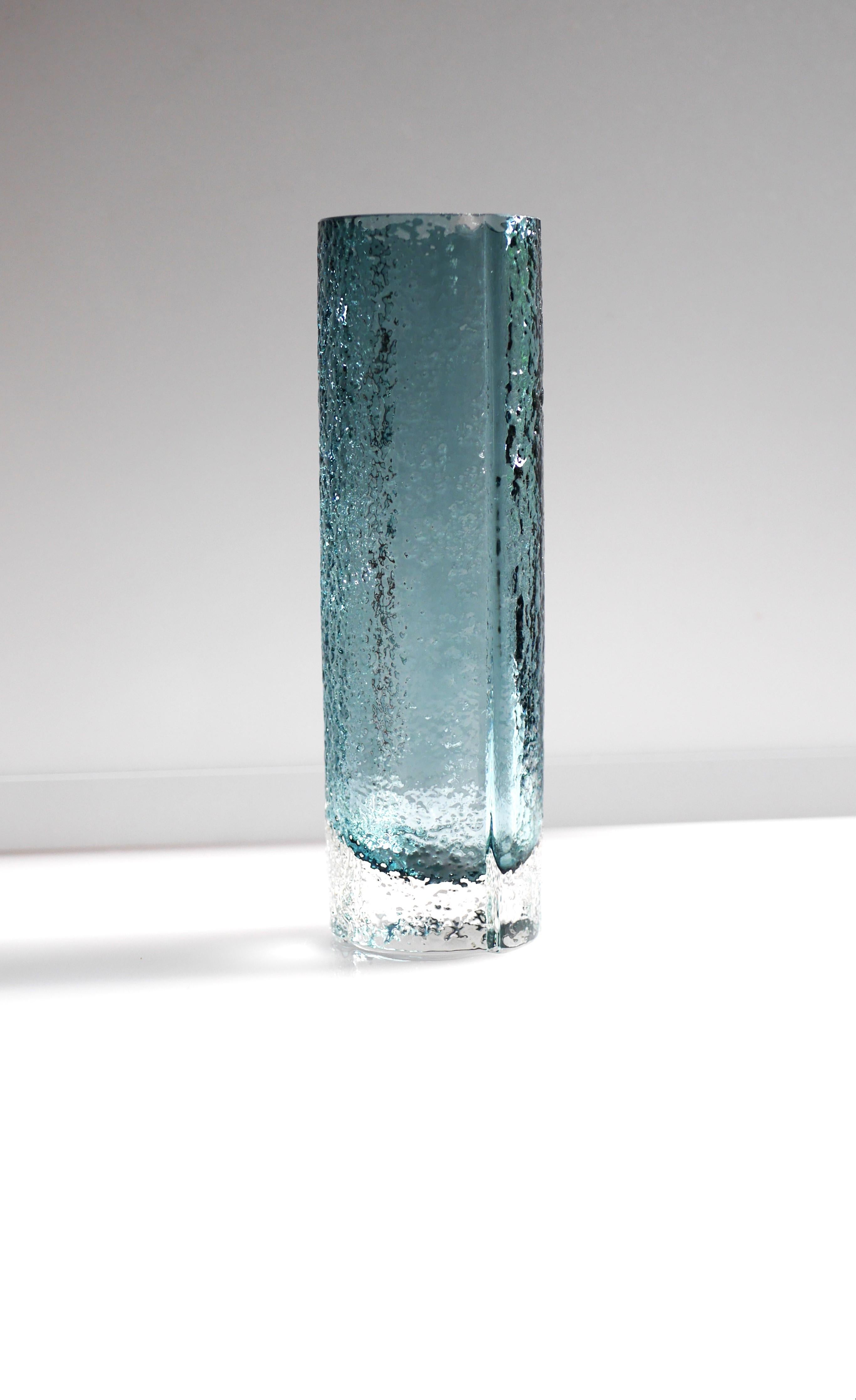 A vintage modernist Finnish art glass vase from the prestigious designer Tamara Aladin.  This vase has the most amazing color, it has a gorgeous grey or pale blue color, covered with clear glass.  This is a very unusual color combination for this