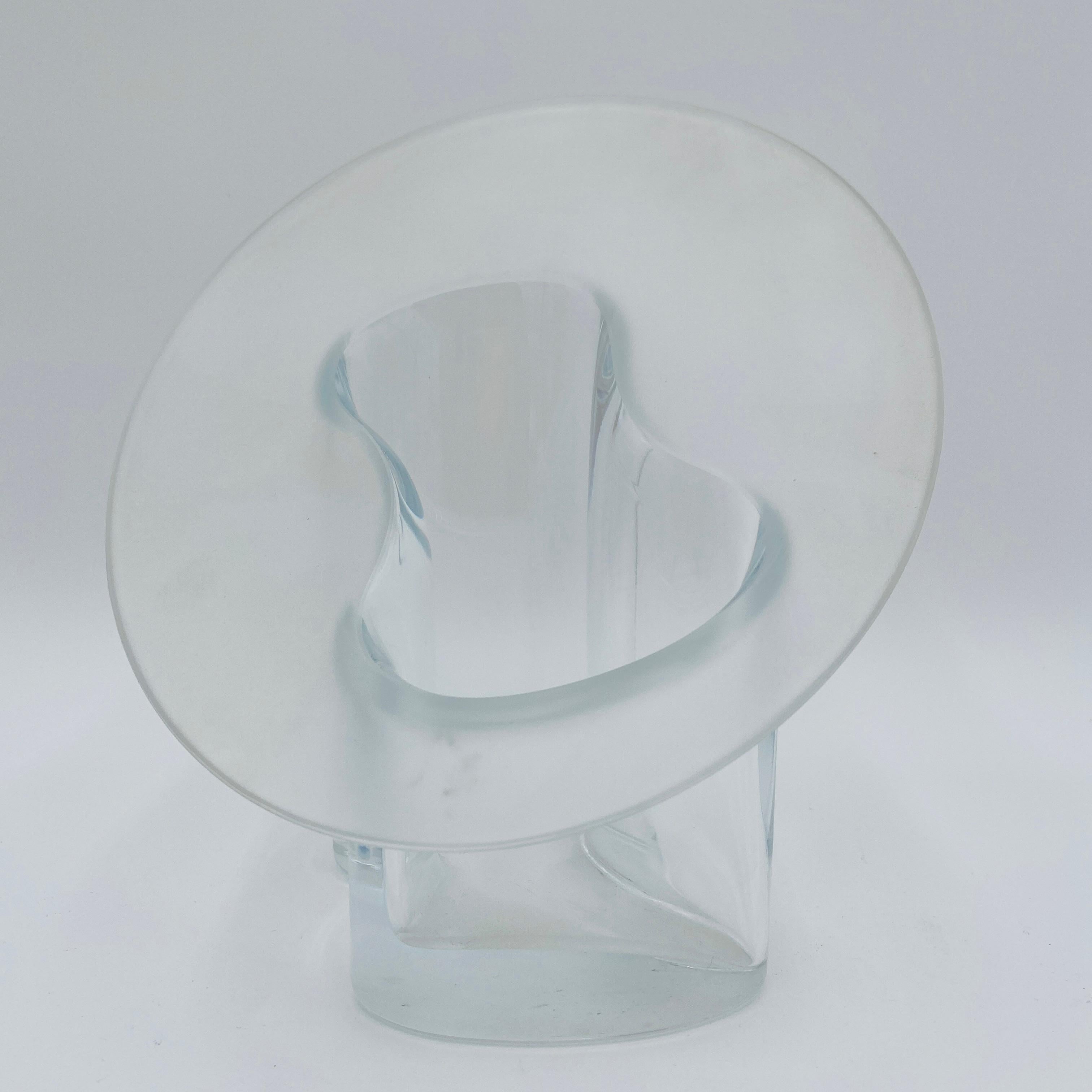 This is a unique glass vase designed by the renowned Timo Sarpaneva for Iittala Glass in Finland. He designed it in 1993, especially for the new residence of the Finnish President. This piece bears his full signature and is dated 1994. Although
