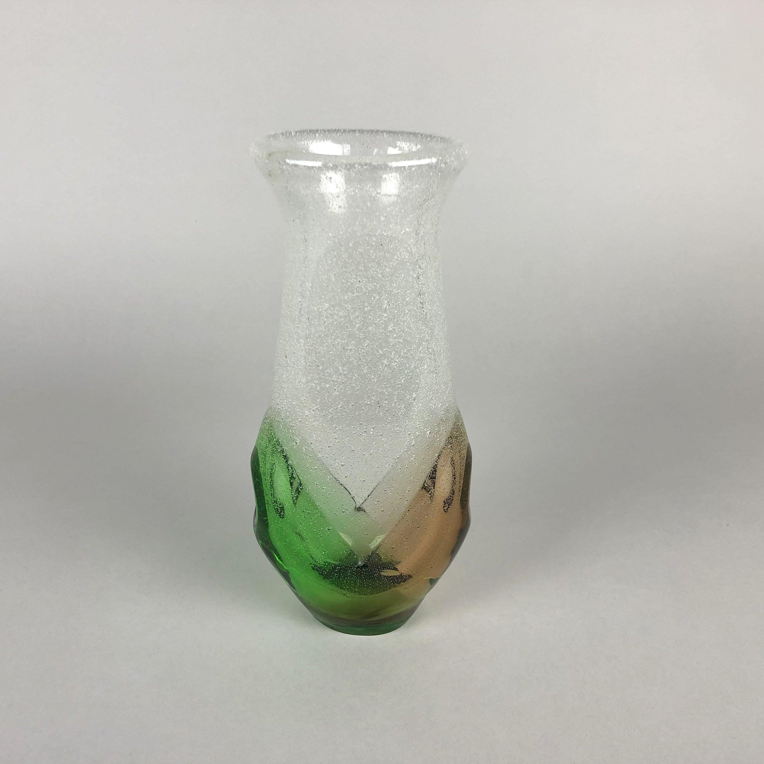 Vintage glass vase, designed by Frantisek Spinar in 1976 and manufactured by Skrdlovice glassworks in Czechoslovakia. 
The vase is approximately 23 cm high (9.06 inch), 10.5 cm (4.13 inch) wide across the widest point and about 6 cm (2.36 inch)