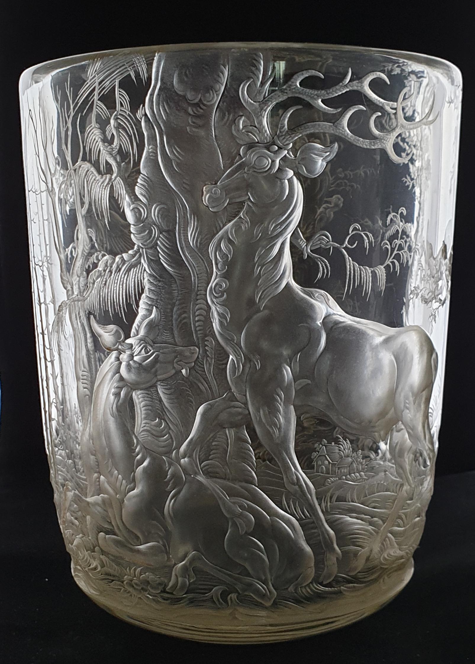 An important example from this famous engraver. Bischof learned glass engraving at Steinschonau, then joined the firm of J&L Lobmeyr in Vienna, where he stayed until 1914. 

His work caused a sensation at the World’s Fair in 1925, and he received