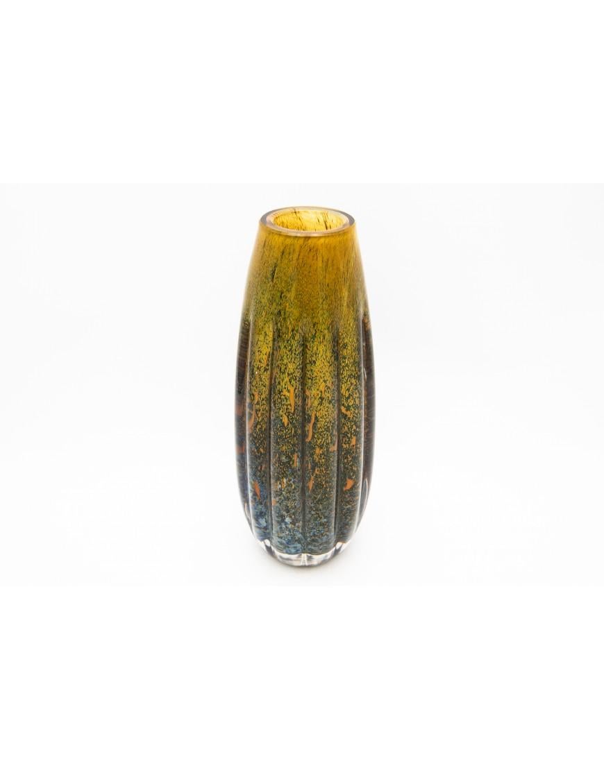 Glass vase, IKORA pattern, WMF, designed by Karl Wiedmann, circa 1930. Colorless, thick-walled glass, with air bubbles, embedded glass powder in yellow, green and blue.

Height: 26 cm

Width: 7 cm