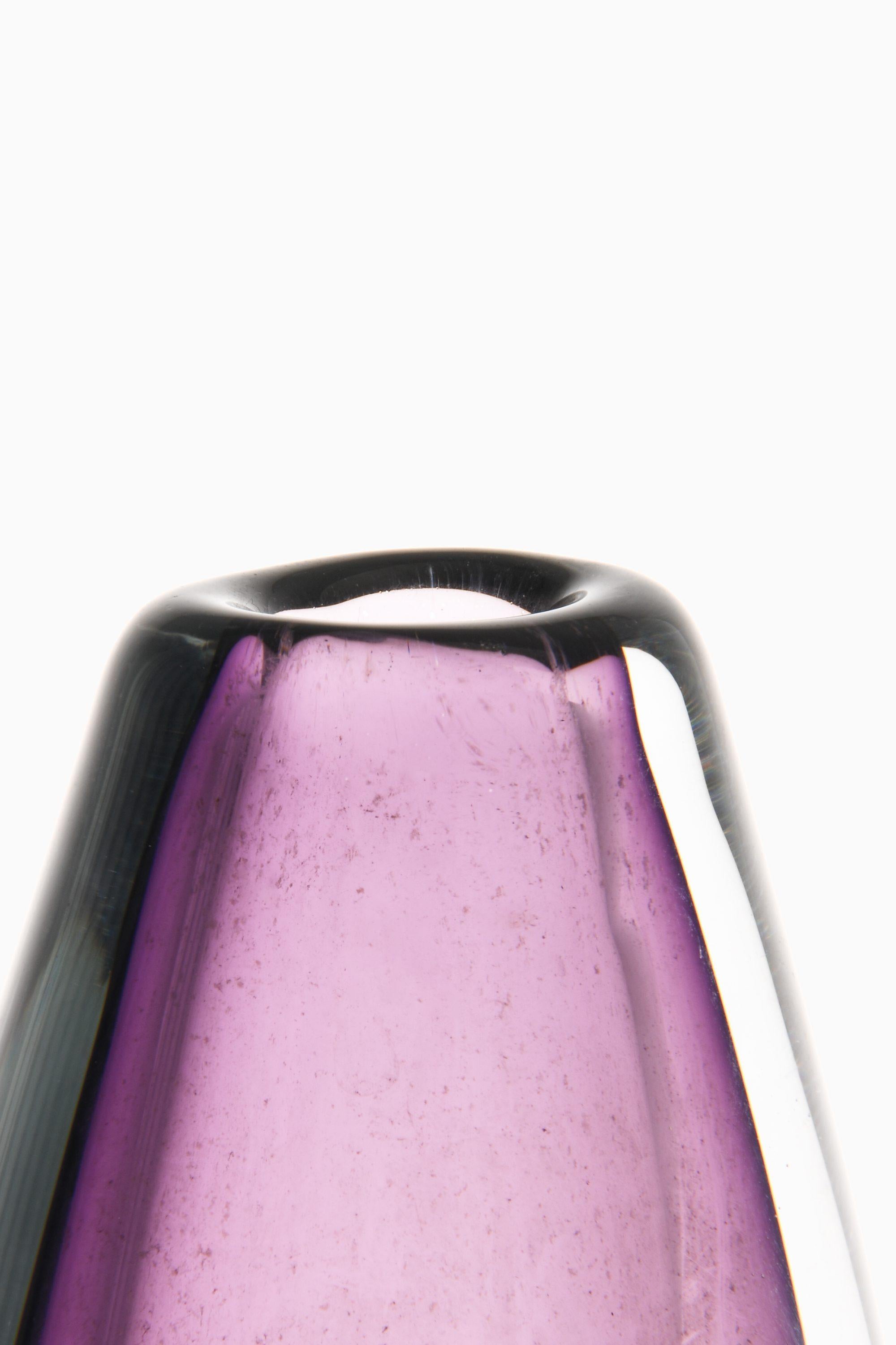 Glass Vase in Purple, 1950's

Additional Information:
Material: Glass
Style: Mid century, Scandinavian
Probably produced by Strömbergshyttan in Sweden
Dimensions (W x D x H): 10 x 6 x 21.5 cm
Condition: Good vintage condition, with small signs of