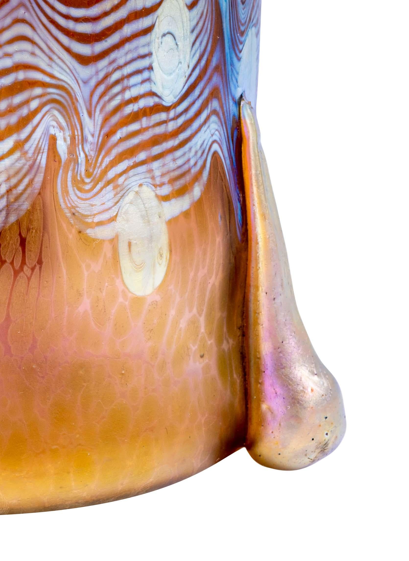 Glass vase designed by Koloman Moser manufactured by Johann Loetz Witwe Argus decoration ca. 1902 Austrian Jugendstil 

This impressive vase wonderfully illustrates the significant collaboration between one of the leading glass manufacturers in