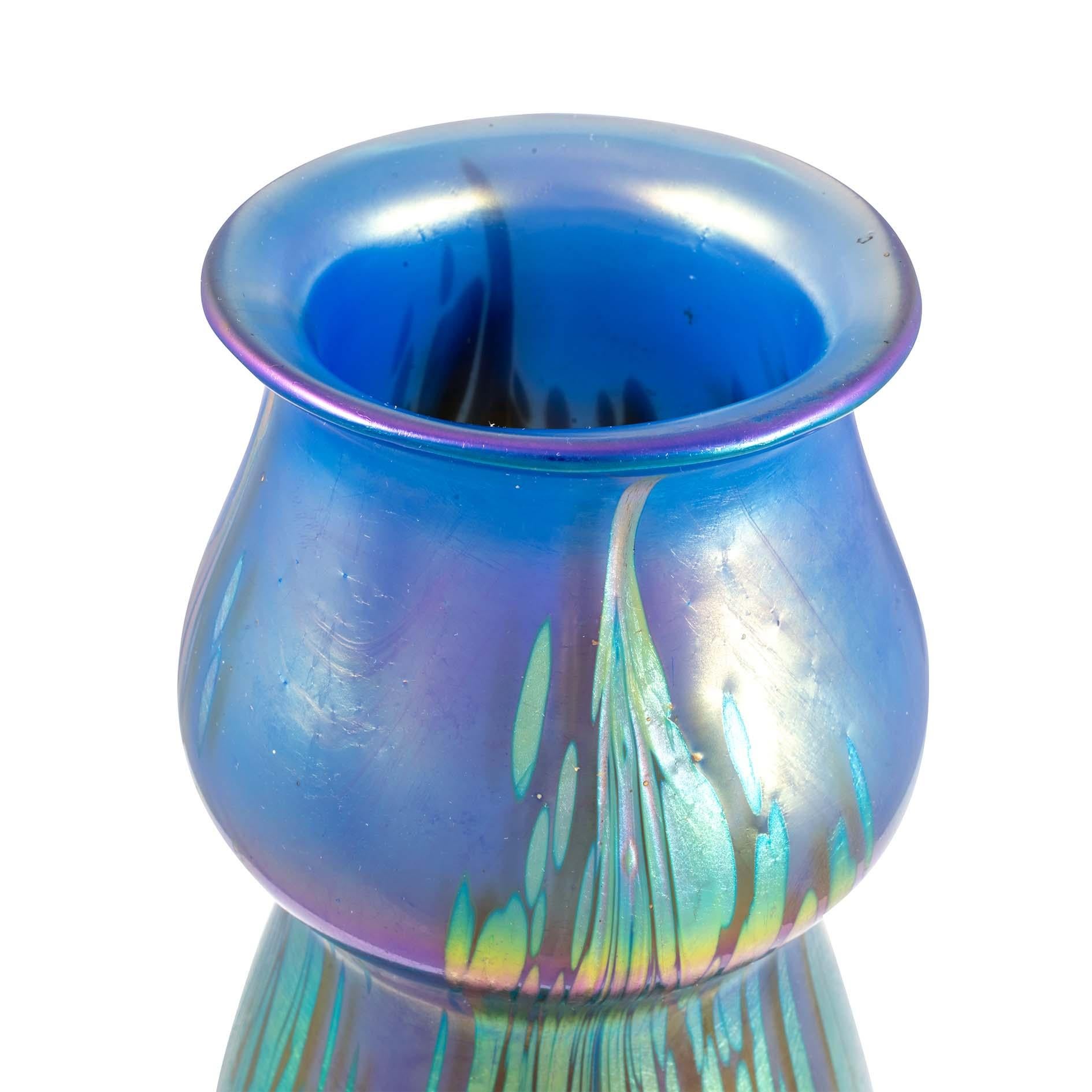 Vase manufactured by Johann Loetz Witwe Medici blue opal decoration ca. 1902 Austrian Jugendstil glass mould-blown reduced and iridescent Rainbow Colors

The decor 