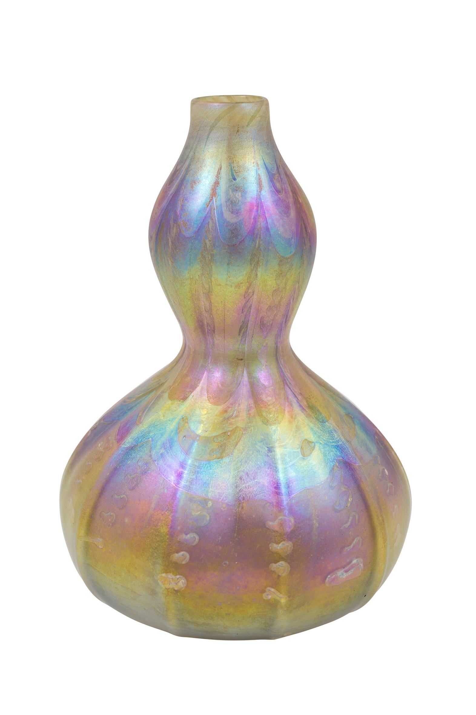 Glass vase designed by Louis C. Tiffany, manufactured by Tiffany Studios New York, 1894, signed

signed 