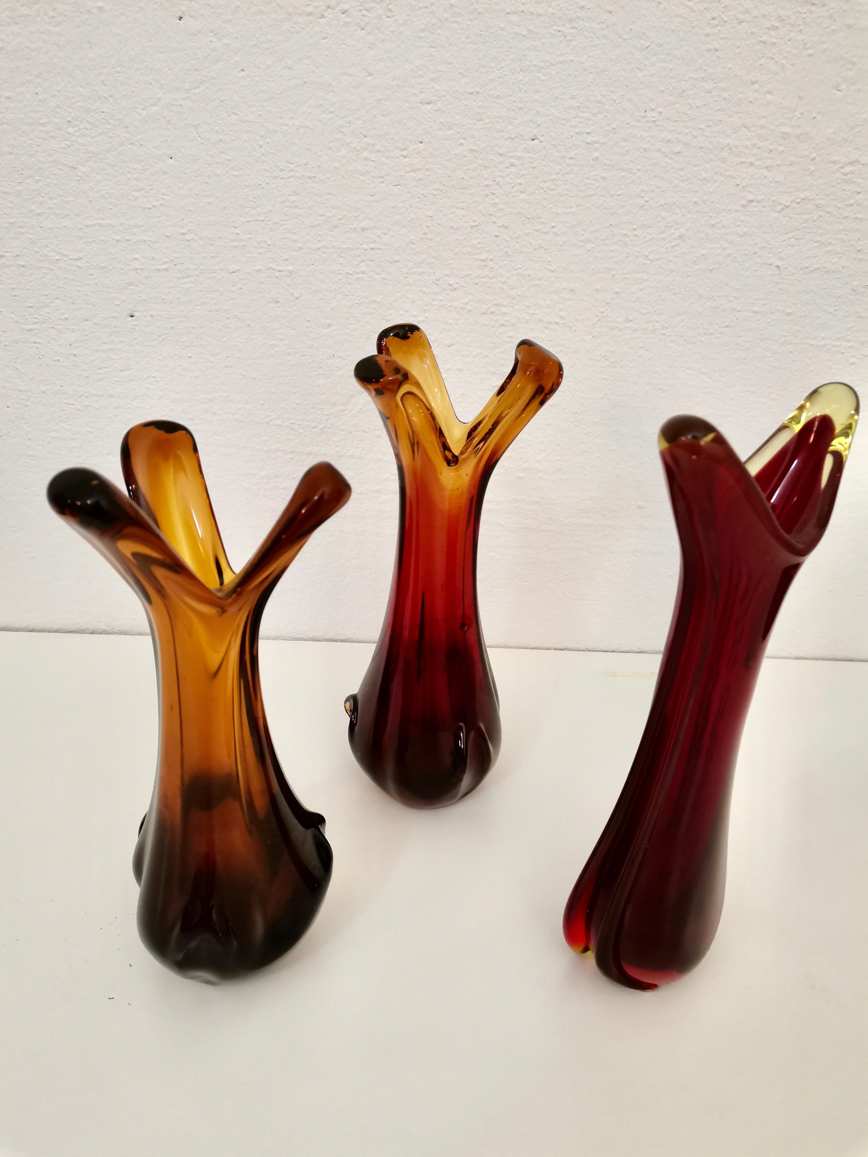 Glass vases: two in orange color and one red.

Condition: mint.

Production period: 1970s.