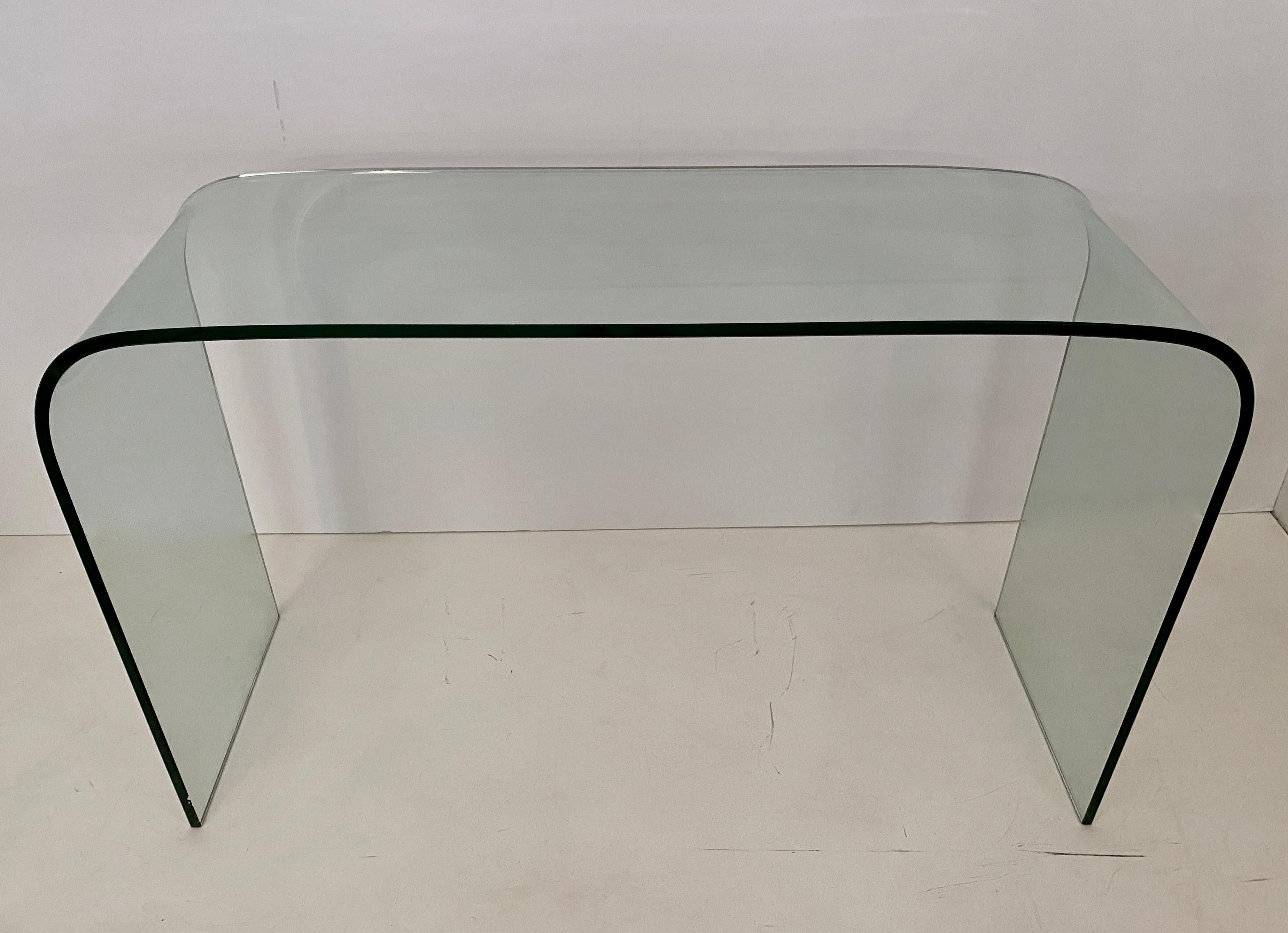 Elegant clear glass console table in pristine condition. Substantial yet 