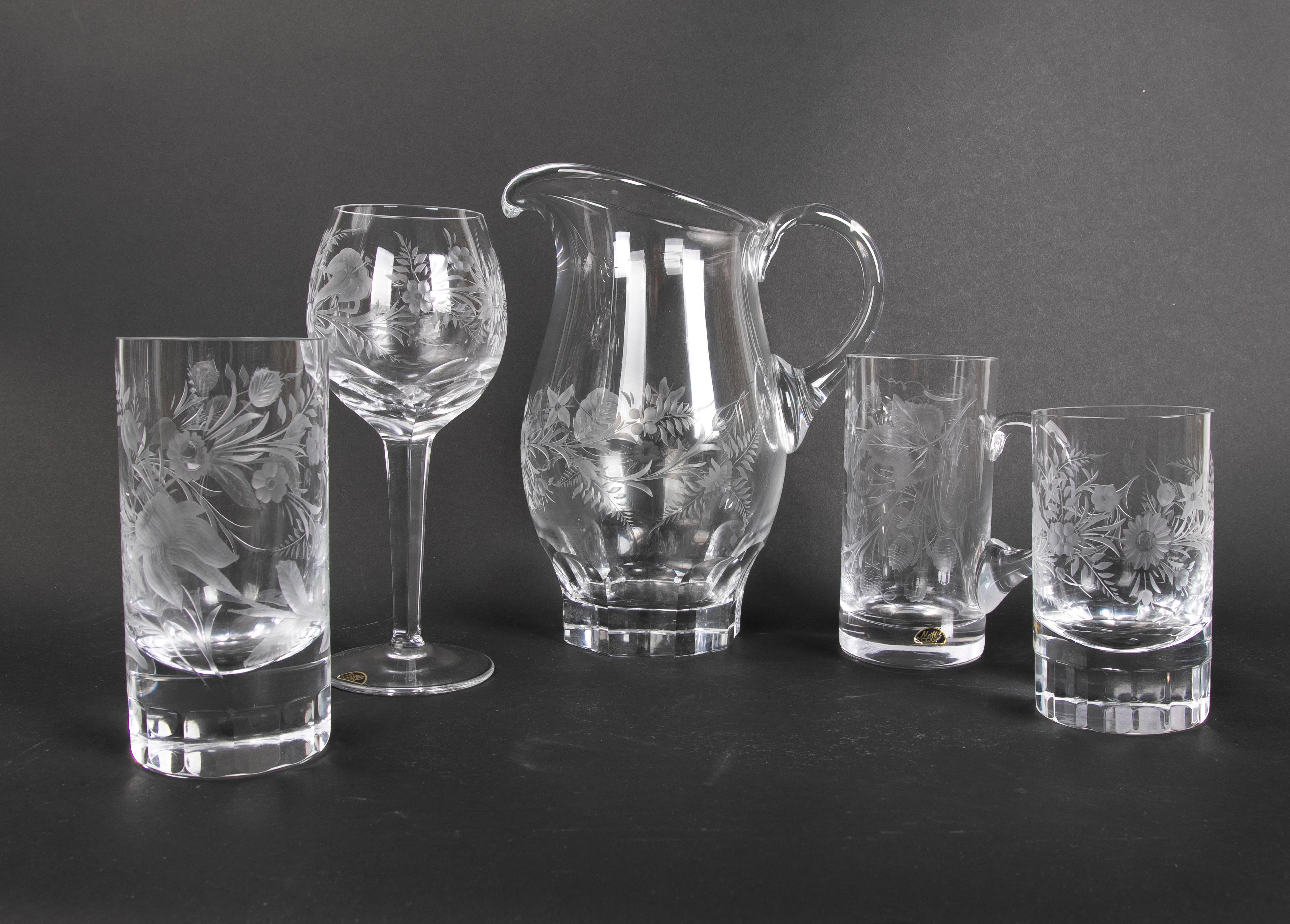 Glassware Composed of seventy-two pieces of cut Bohemian Crystal
The quantities are as follows:
- 1 Jug of water
- 29 Glasses
- 16 Jugs
- 11 Medium glasses
- 18 Small glasses.
   