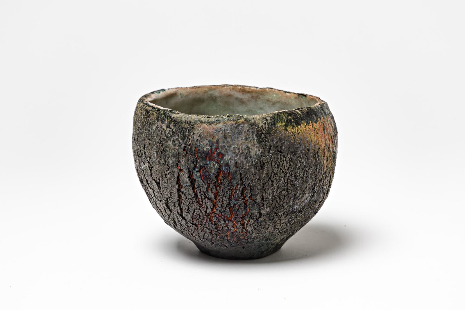 Glazed black ceramic bowl by Gisèle Buthod Garçon. 
Raku fired. Artist monogram et signature under the base. Circa 1980-1990. 
H : 3.9’ x 4.7’ inches.