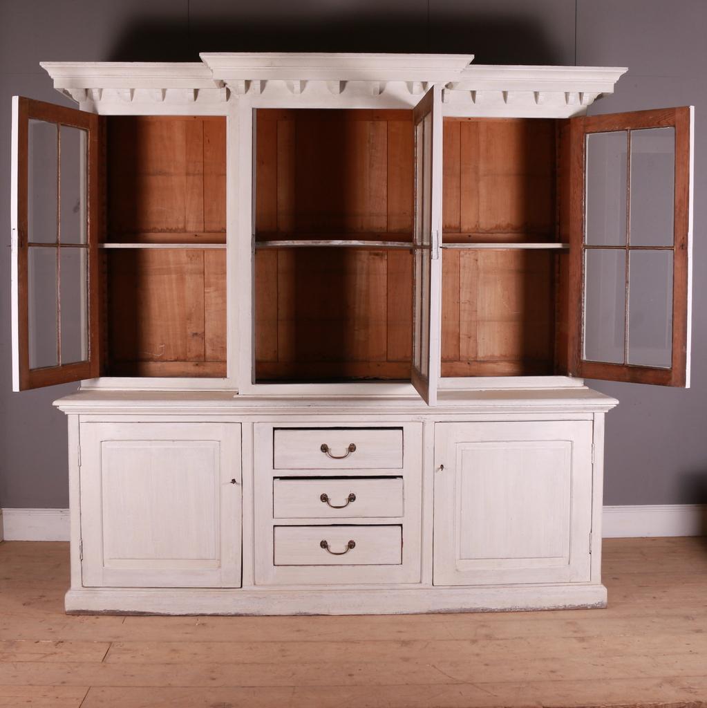 Large and very unusual glazed breakfront kitchen cabinet. Huge amount of storage. 1880.

Top section wing depth is 18