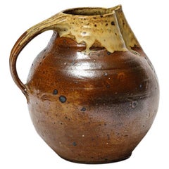 Glazed cemic pitcher by Jacky Coville, circa 1960-1970.