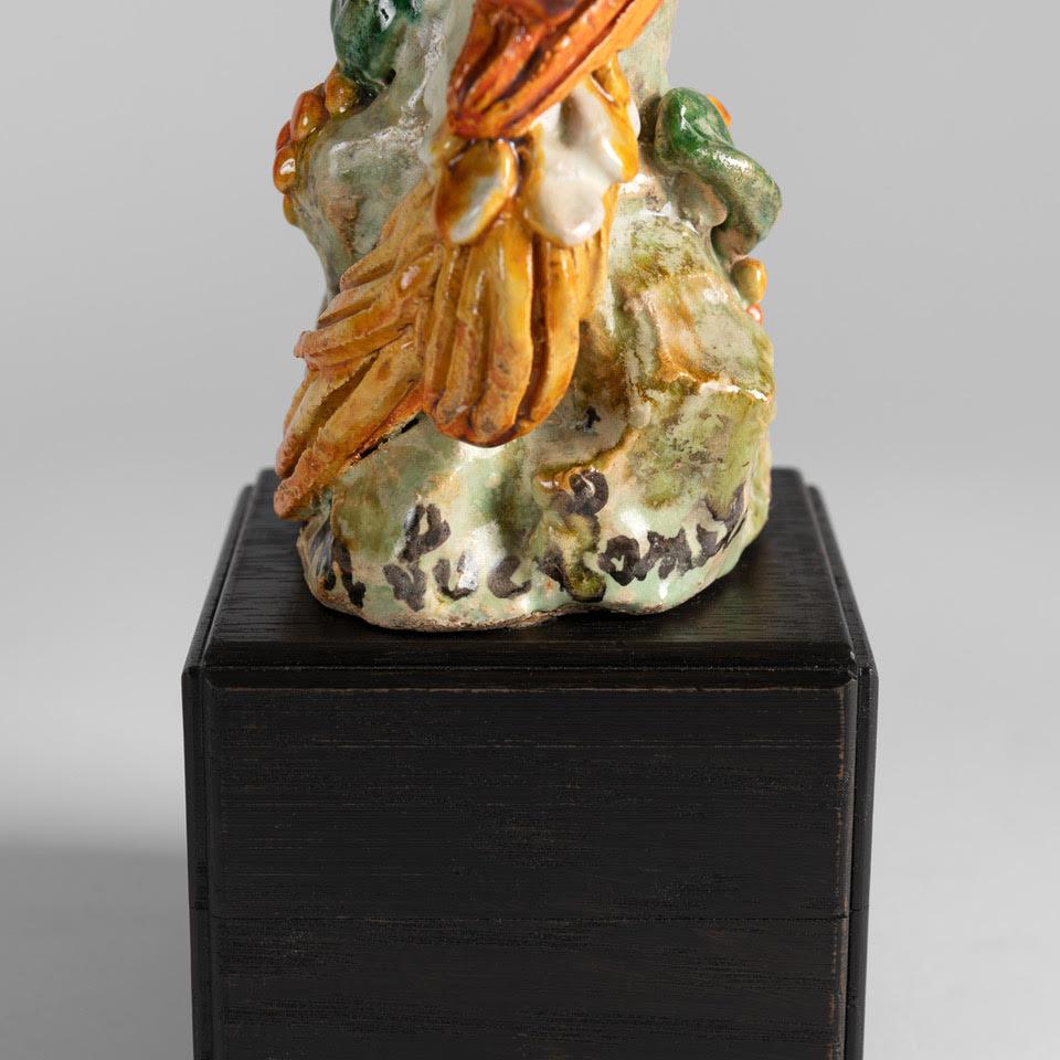 This playful pair of glazed cockatoos were once in the collection of Mario Buatta.