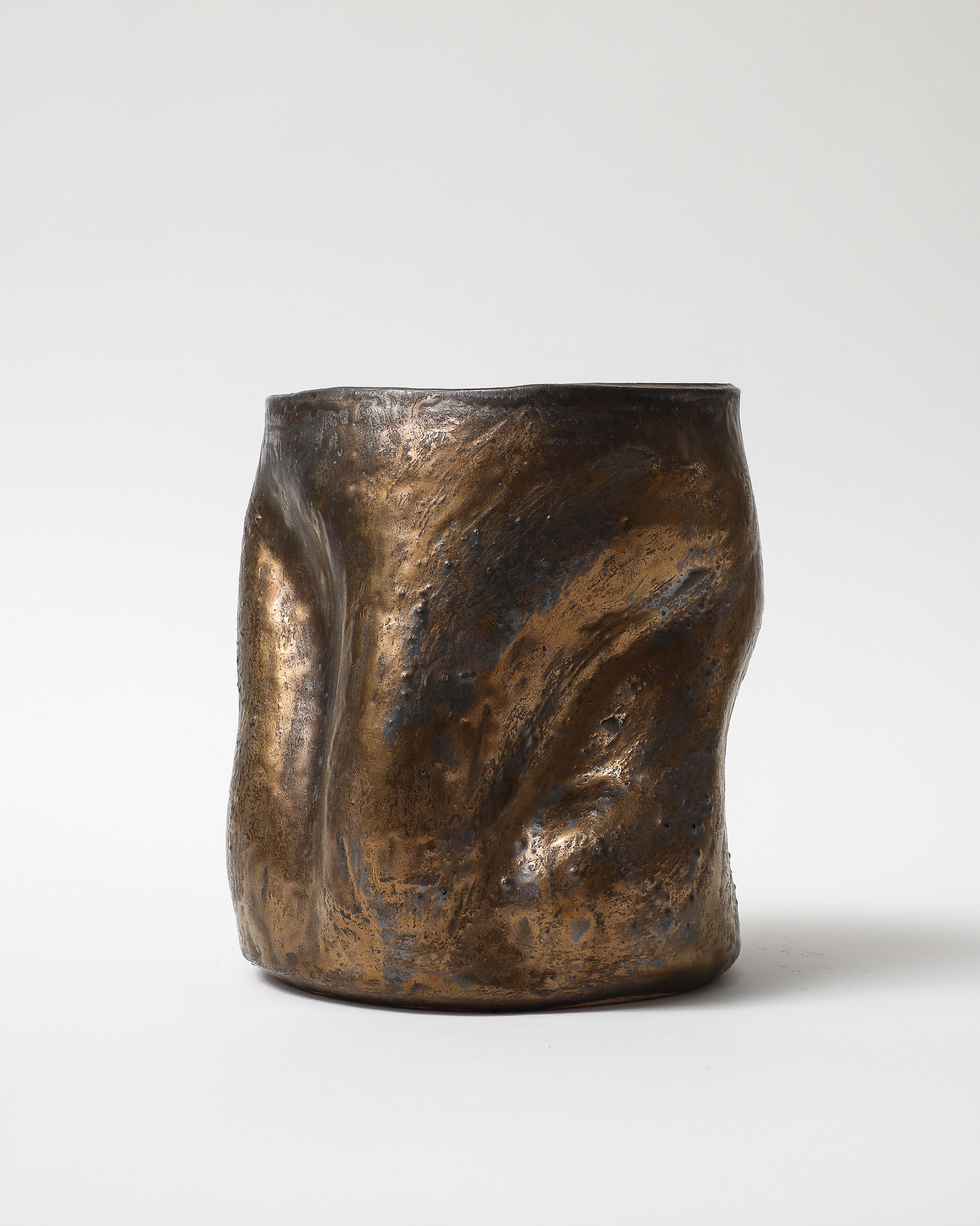 Bronze colored glazed ceramic vase. Hand formed, with undulating curves throughout.