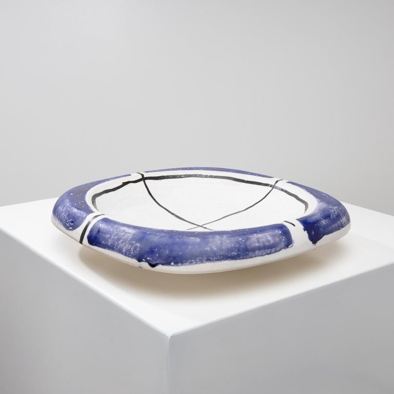 Large glazed ceramic bowl in the shape of a 