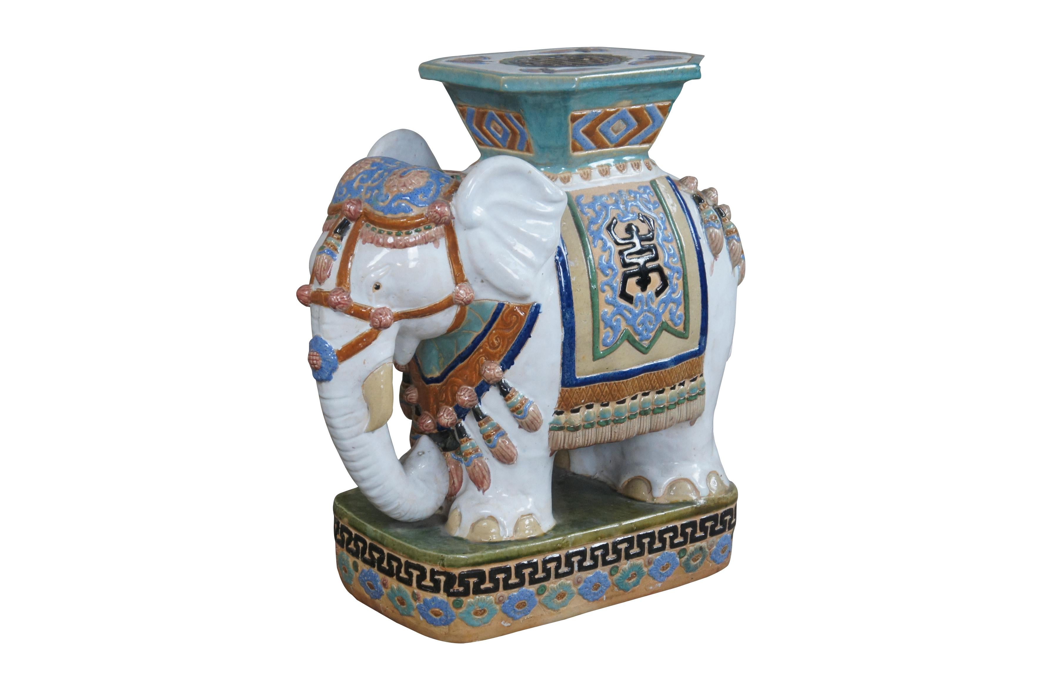 Vintage faience glazed ceramic polychrome elephant garden stool, seat or side table.  Circa 1960s.

Dimensions:
21