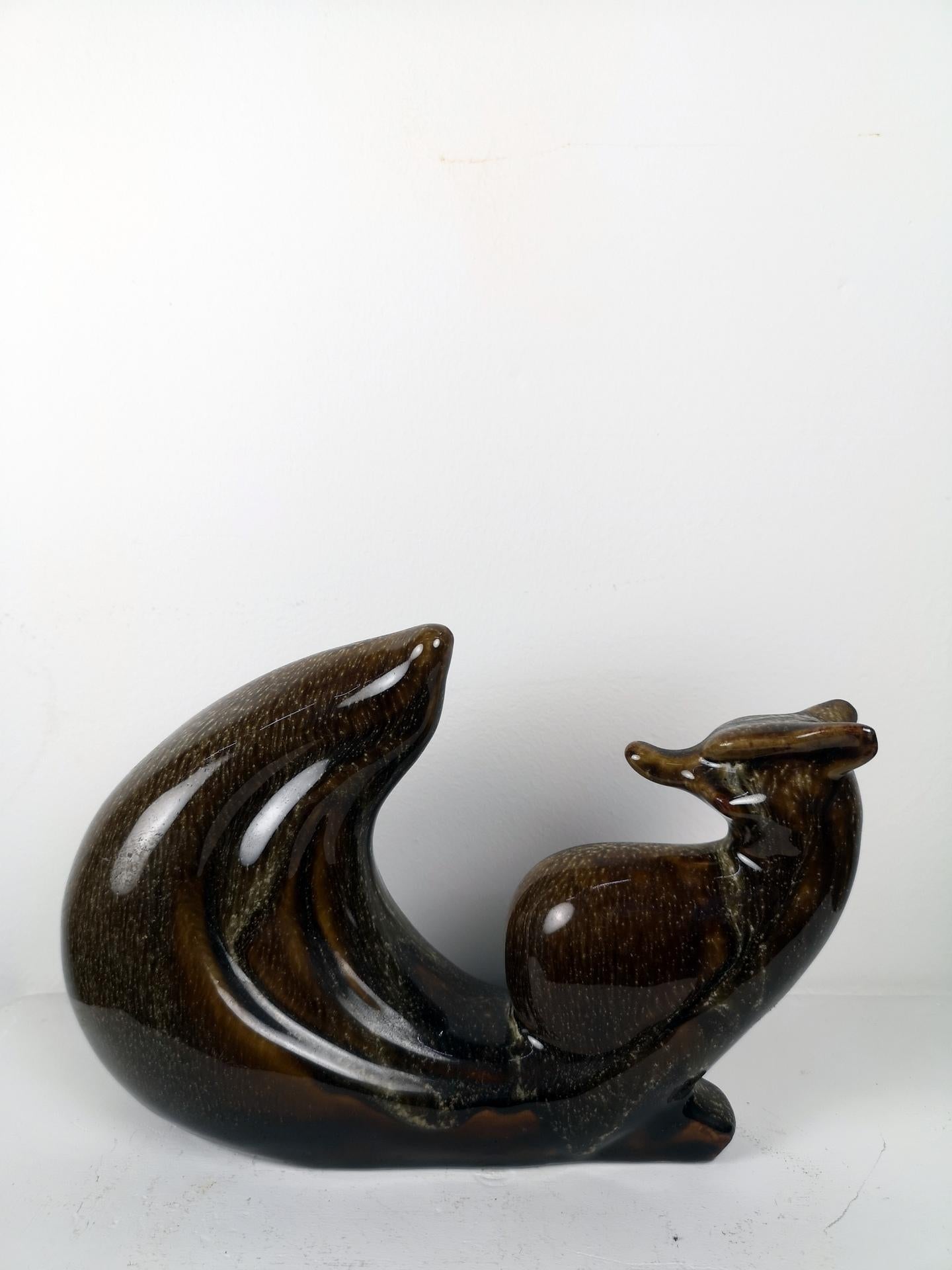 This larged tailed brown ceramic fox was made in the 1960s, probably in the USSR.