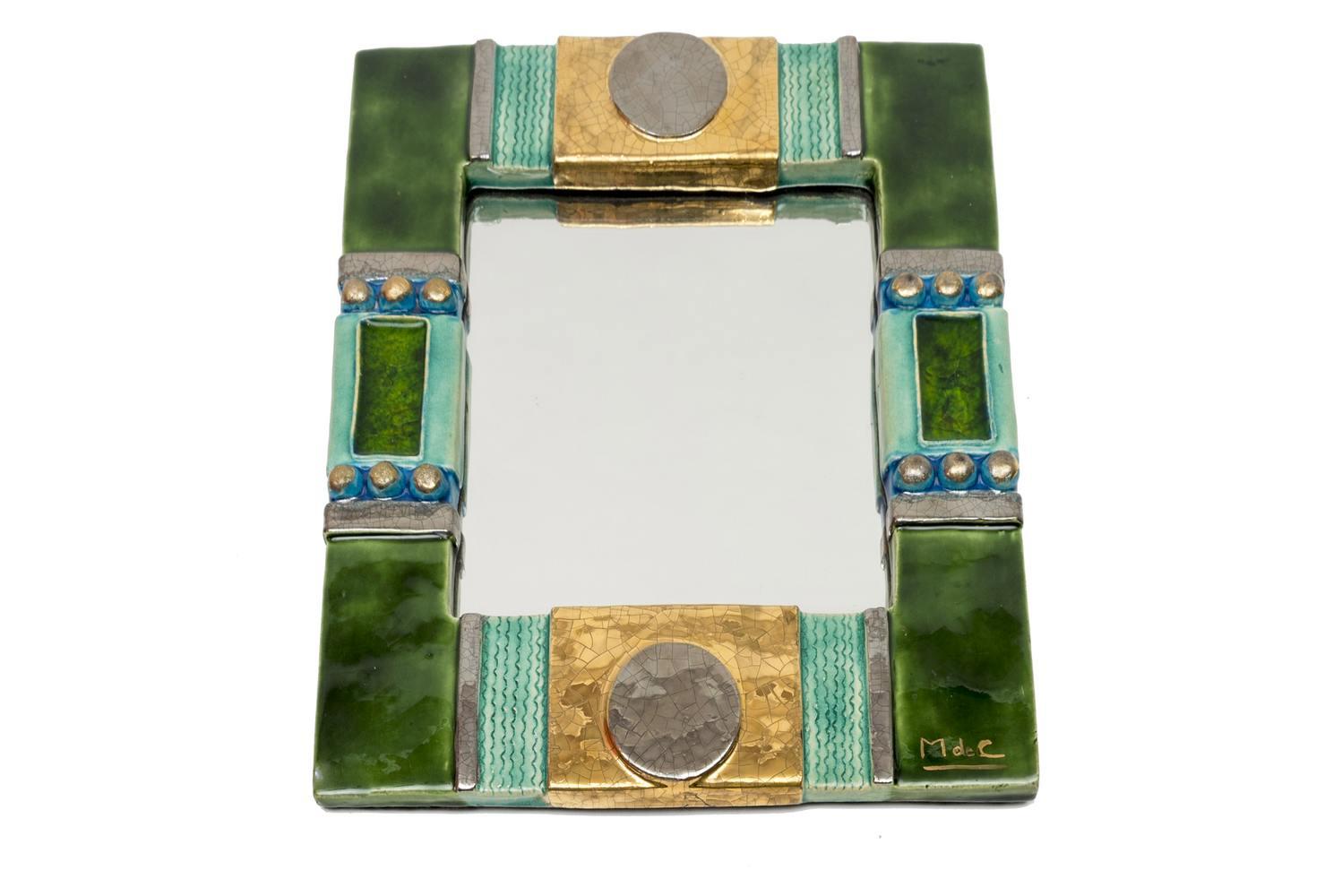 Very nice enamelled ceramic rectangular mirror.
Signed on the bottom right 