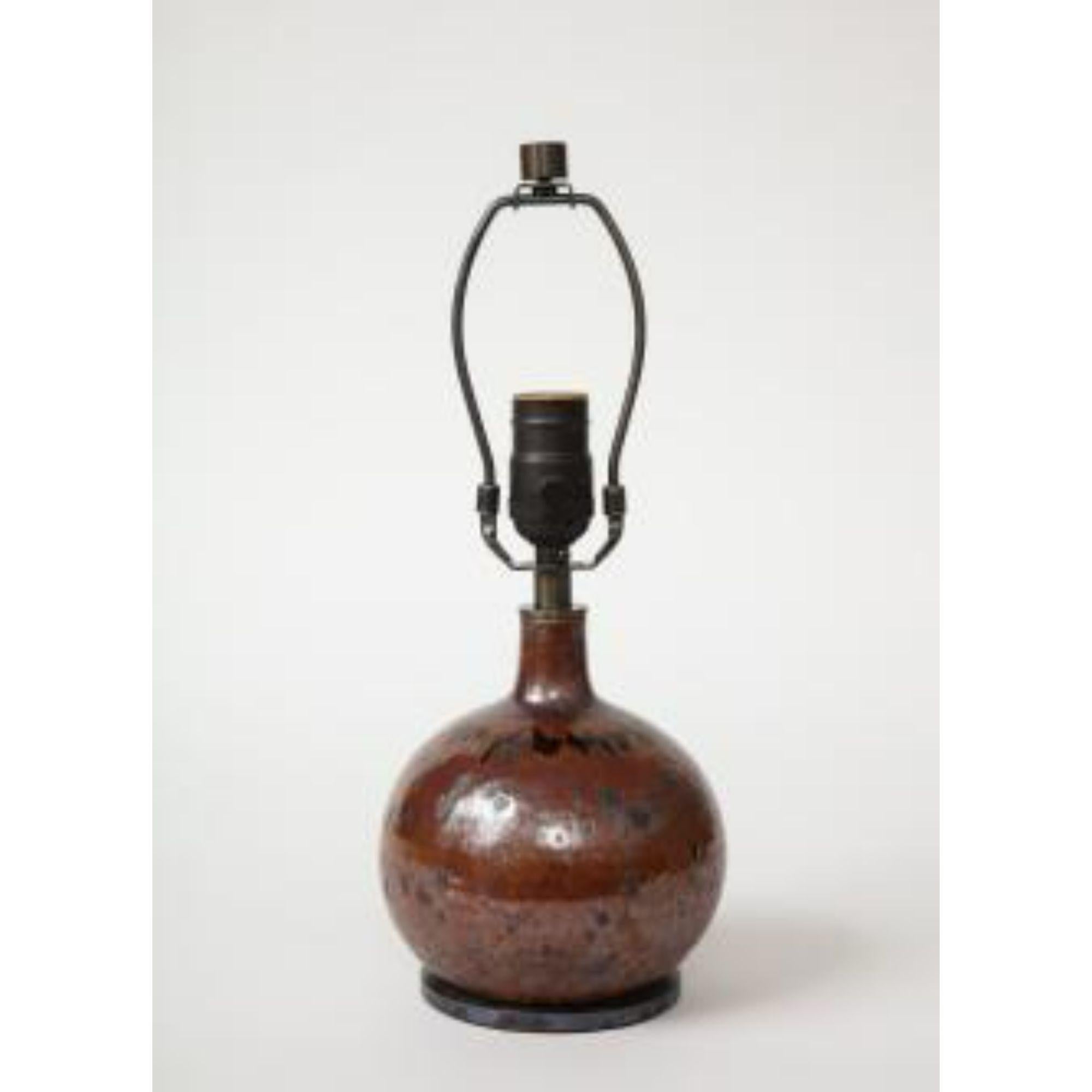 Small Round Mid-Century Brown Ceramic Lamp, France, c. 1960s

This lamp has been rewired and outfitted with a custom base as well as a black twisted silk cord.


