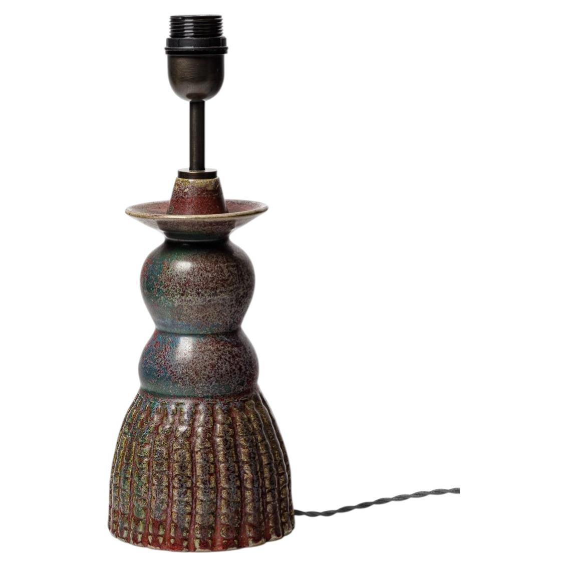 Glazed ceramic table lamp by Jean Maubrou, circa 1940.