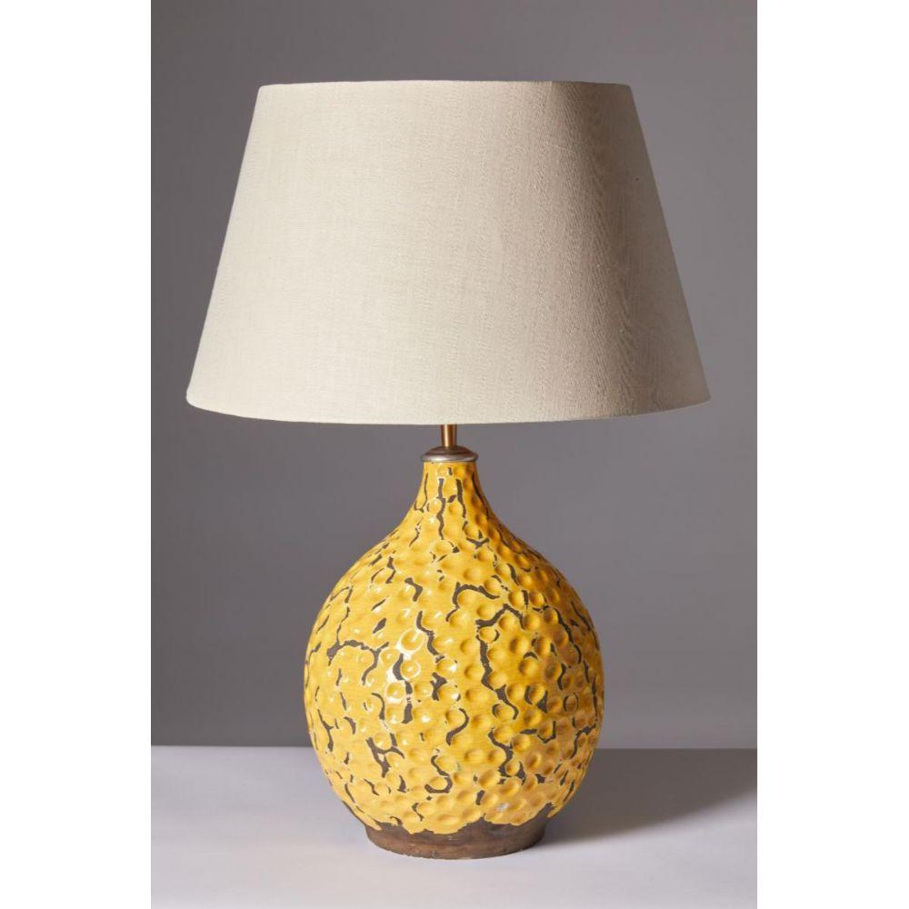 Glazed Ceramic Table Lamp, Keramos, France, c. 1940

Monumental glazed ceramic table lamp by Keramos, France. The yellow glaze beautifully highlights the patterned stoneware body of the lamp. Original wiring, ready to be rewired.
