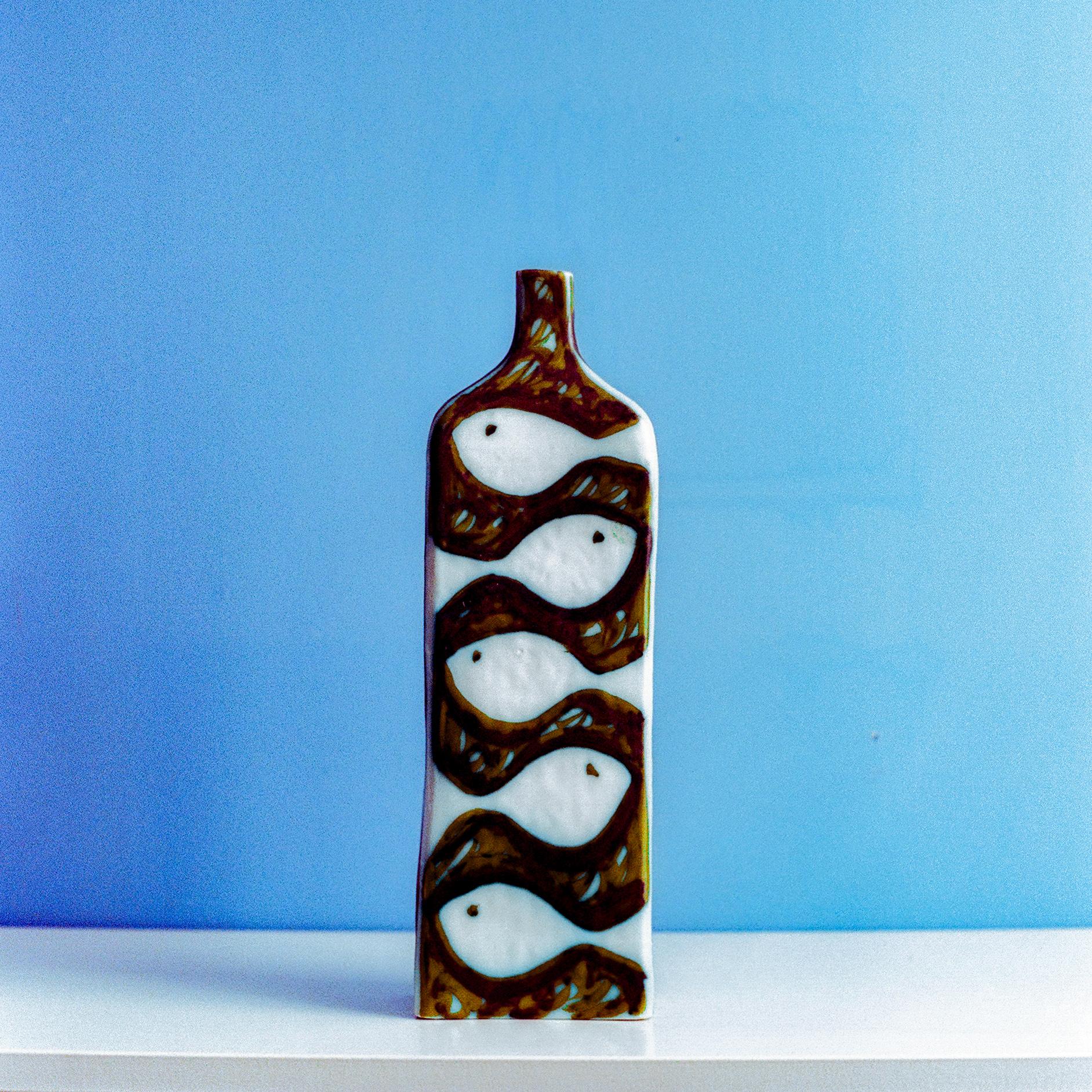 Glazed Ceramic Vase by Alessio Tasca for Raymor, Italy, c. 1960

Tall porcelain vase with hand drawn illustration. The front side is decorated with fish, and the back with two figures.

-

Materials: Glazed Porcelain/Ceramic 
Dimensions: H 14