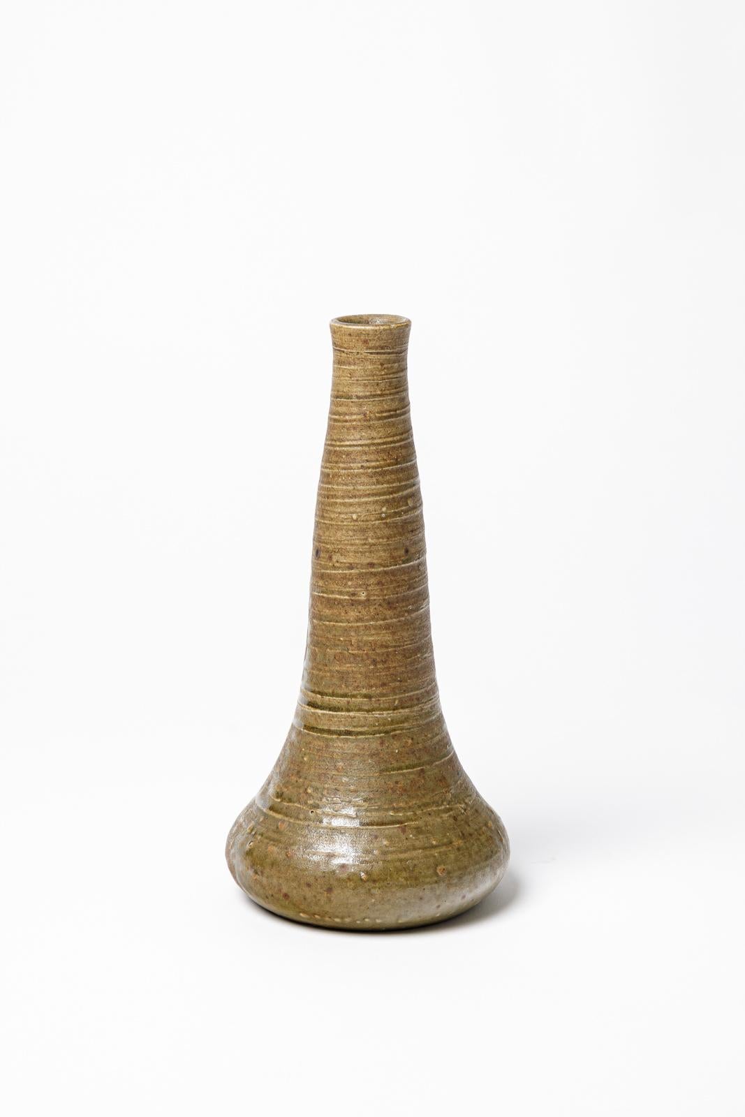 Glazed ceramic vase by Alexandre Bigot. 
Artist monogram under the base. Circa 1920.
H : 9.4 x 4.3 inches.

