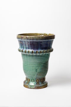 Glazed ceramic vase by Jean Maubrou, circa 1940.