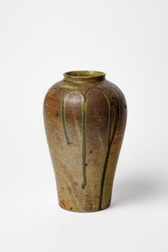 Glazed ceramic vase by Lucien Arnaud, circa 1920.