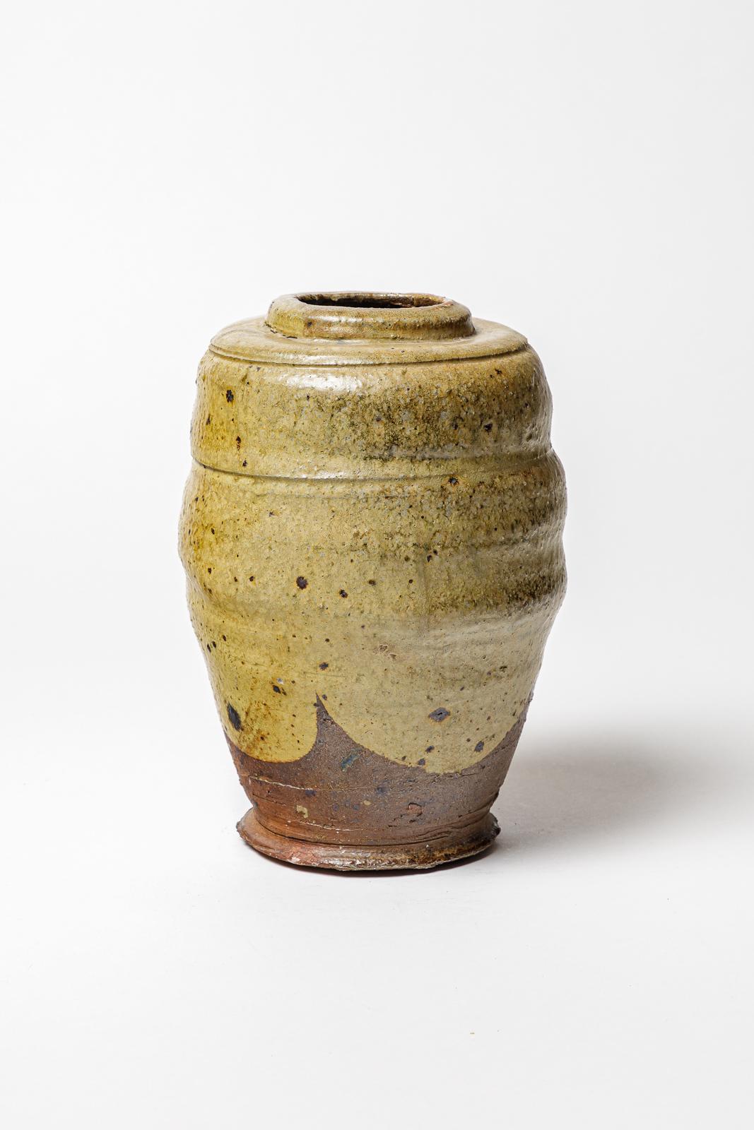 Vaso in ceramica smaltata. 
Opera francese, Puisaye. Circa 1920.
H. : 9,6 x 5,9 pollici.
