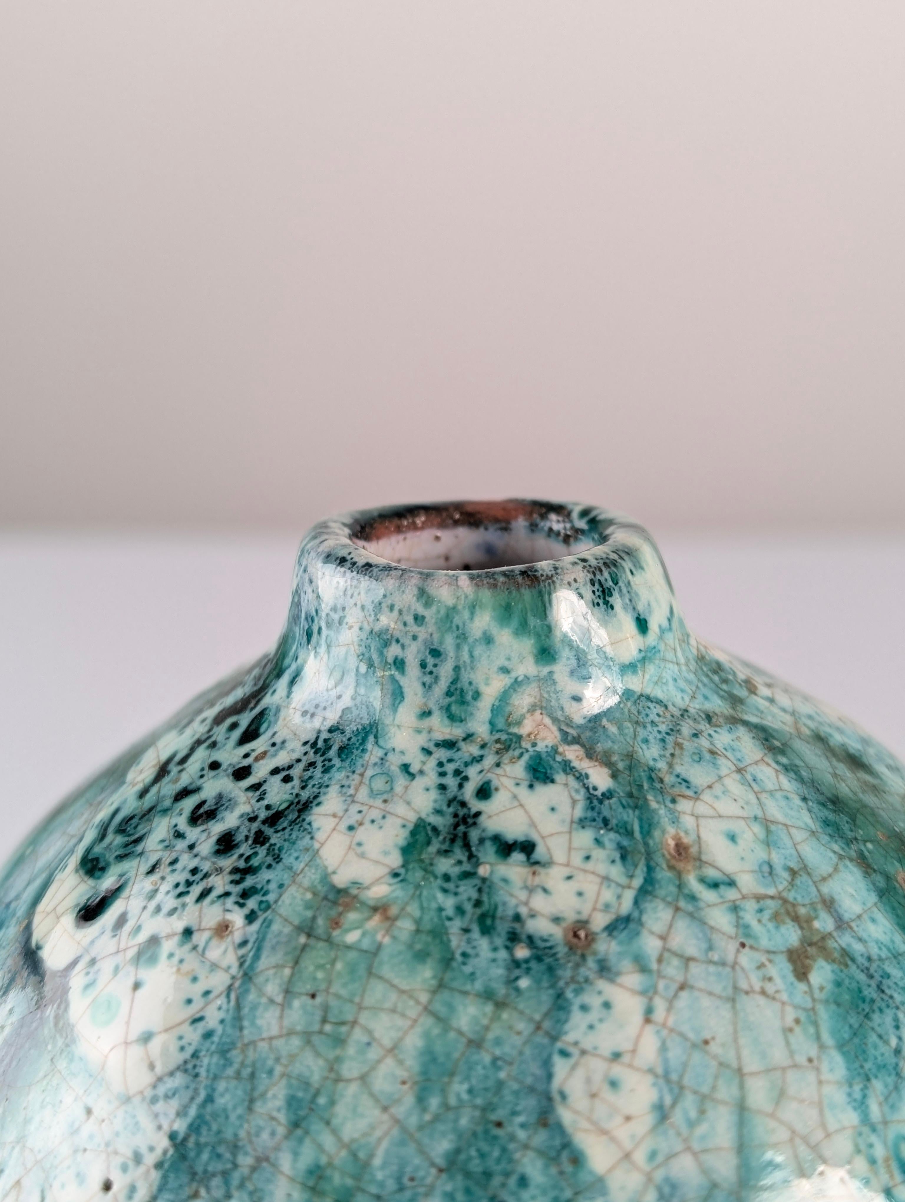 Ceramic vase signed by renowned Spanish ceramist Angelina Alós (Valencia, 1917 – Esplugues de Llobregat, 1997), a pivotal figure in contemporary Catalan ceramics. This piece is a truly unusual model that reflects her innovative approach to form and