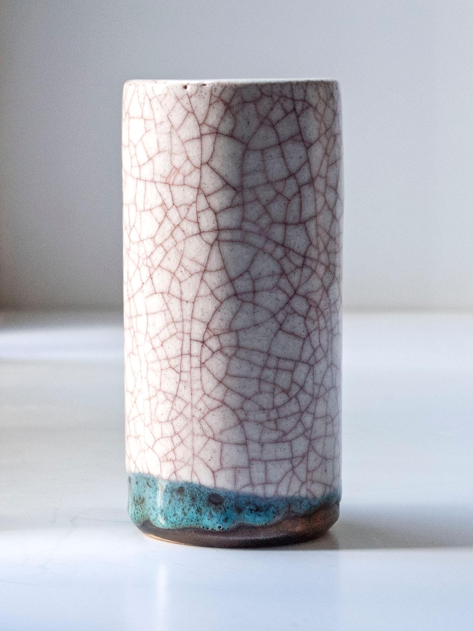 Glazed Ceramic Vase by Pieter Groeneveldt,  The Netherlands, c. 1960

Cream,  pink, and cerulean green glazed ceramic vase by Dutch ceramicist Pieter Groeneveldt. 

-

Materials: Glazed Ceramic 

Dimensions: H 7