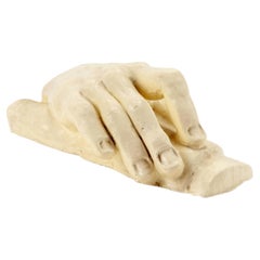 Glazed clay sculpture depicting a hand, Italy 1900.