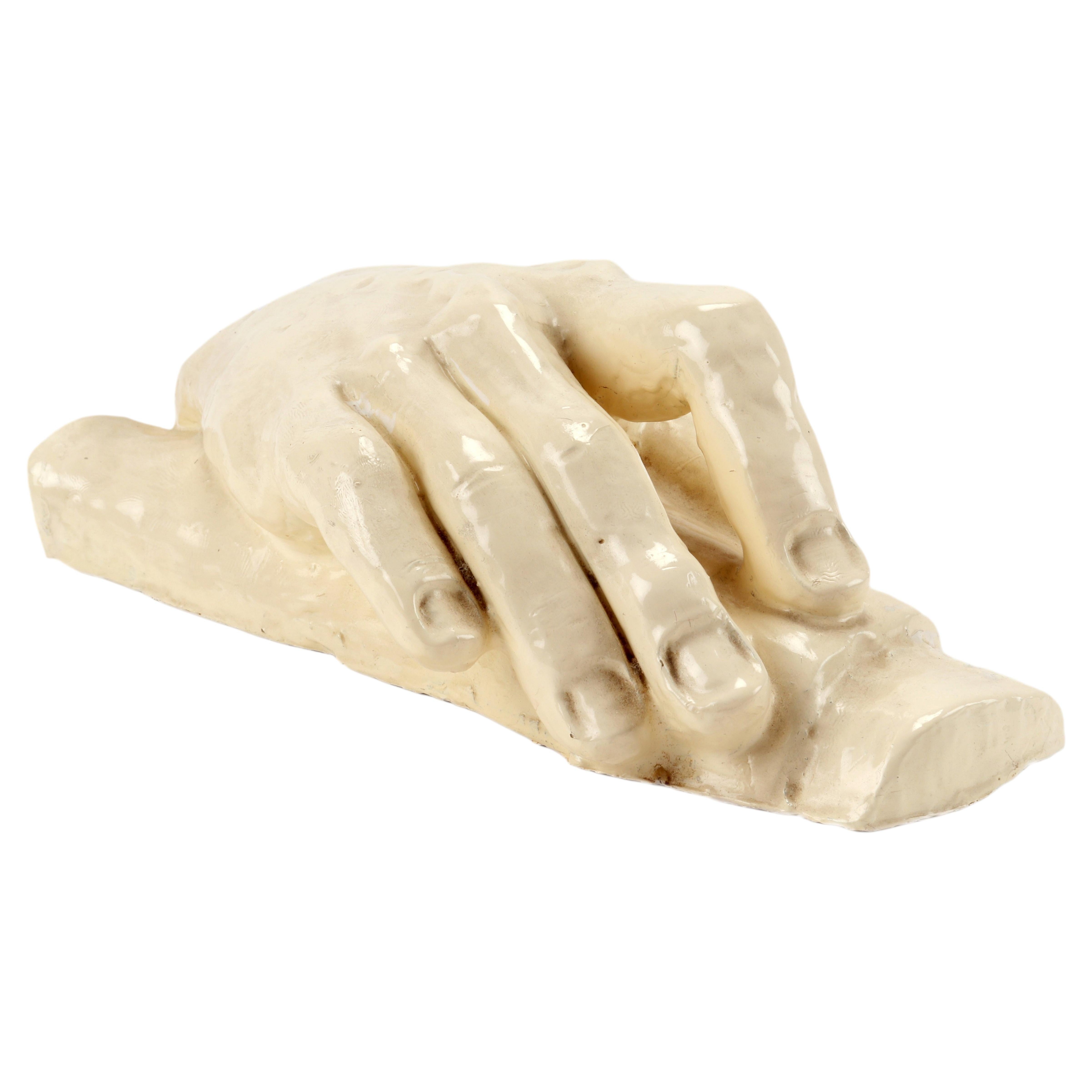 Glazed clay sculpture depicting a hand, Italy 1900. For Sale