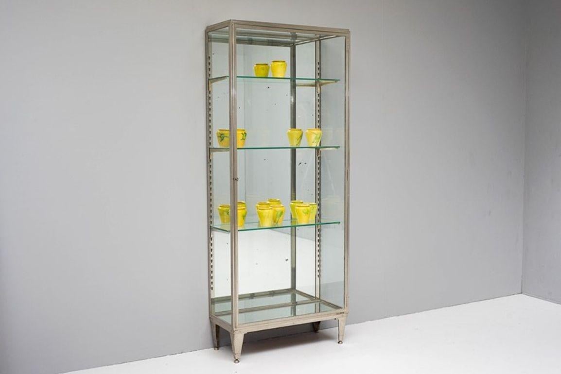 Large glazed display cabinet in chrome by Siegel.

France Circa 1900.

H 171cm x W 70cm x D 31cm