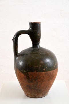 Glazed earthenware jug, southern France, early 20th century