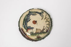 Glazed earthenware medaillon, with fantastical animals by Jérôme Galvin.