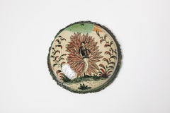 Glazed earthenware medaillon, with fantastical animals by Jérôme Galvin.