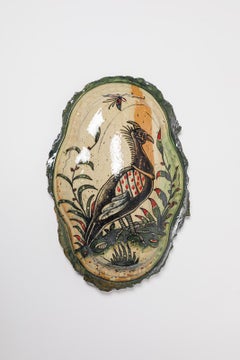 Glazed earthenware medaillon, with fantastical animals by Jérôme Galvin.