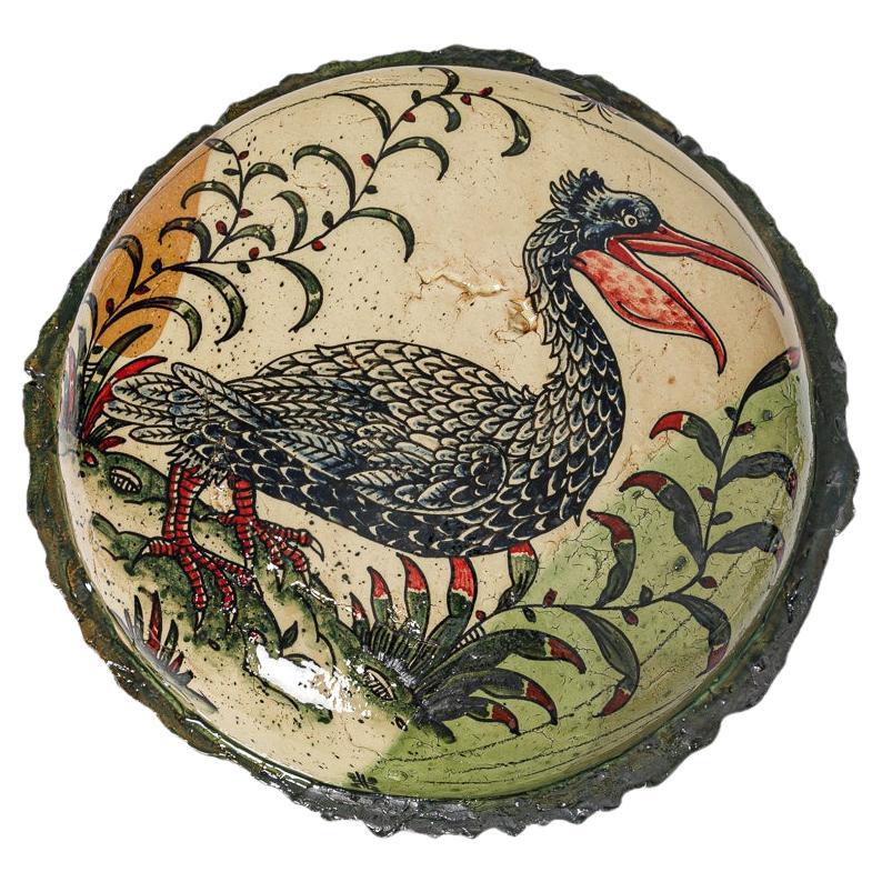 Glazed earthenware medaillon, with fantastical animals by Jérôme Galvin.