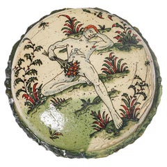 Medallón de loza vidriada, con animales fantásticos de Jérôme Galvin.