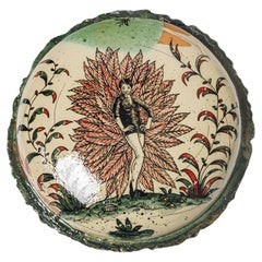Glazed earthenware medaillon, with fantastical animals by Jérôme Galvin.