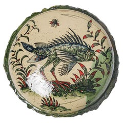 Glazed earthenware medaillon, with fantastical animals by Jérôme Galvin.