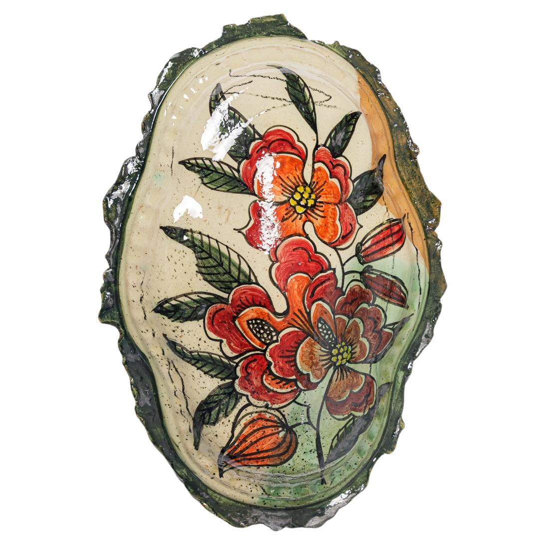 Glazed earthenware medaillon, with fantastical animals by Jérôme Galvin. For Sale